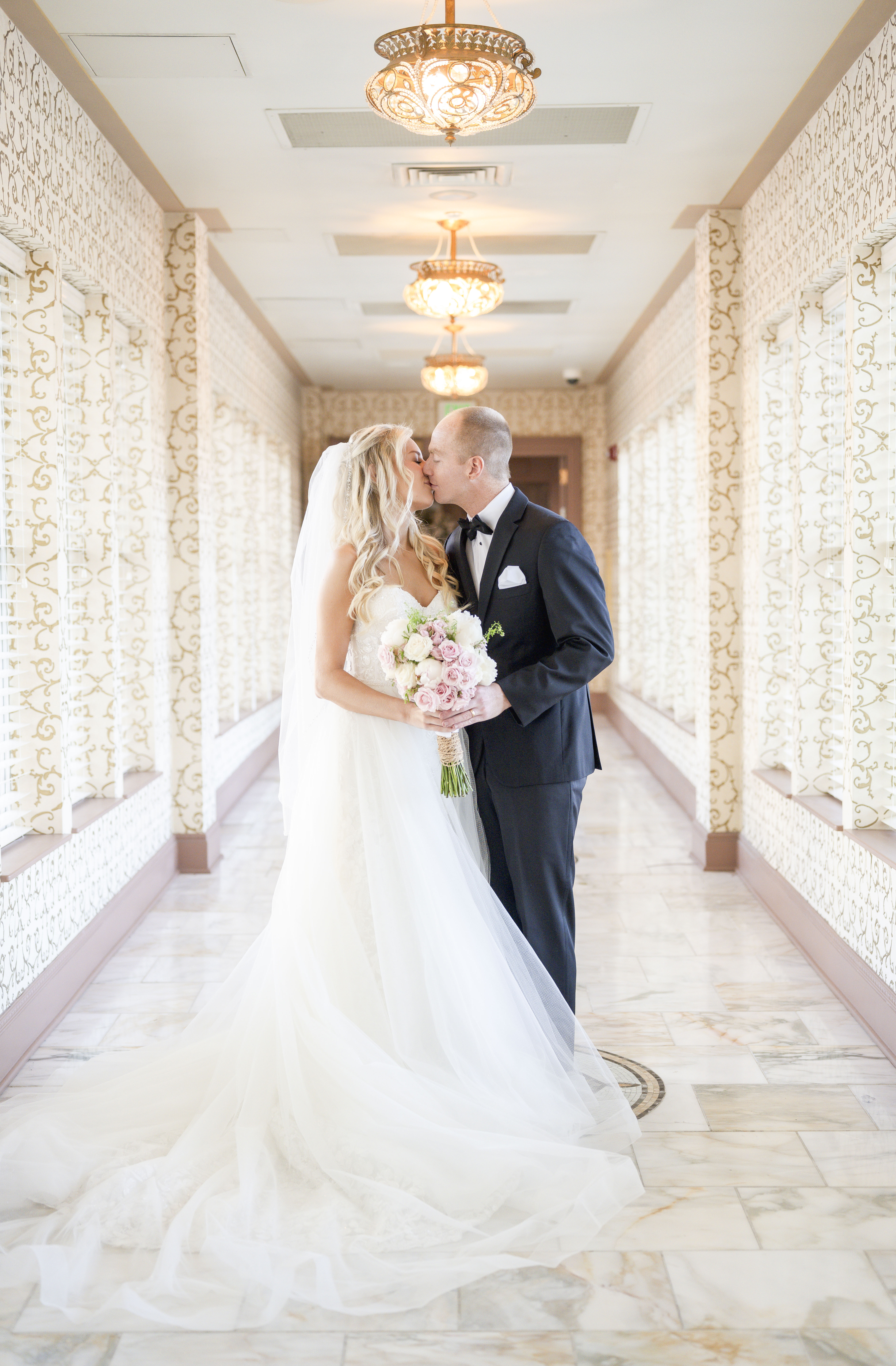 Couple kissing during wedding photos at French Lick Resort